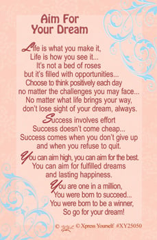 A poster that says "Aim for your dream" on it.