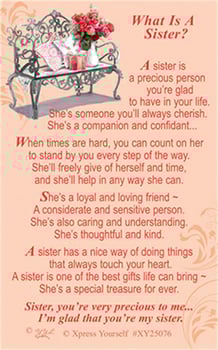 A poster that says "What is a sister?".