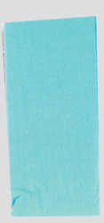 A piece of blue paper is sitting on a white surface.