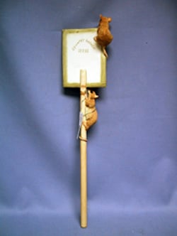 A picture frame with a picture of two mice on it.