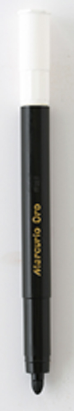 A black and white bottle with the word Miraglio on it.