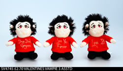 Three stuffed monkeys wearing red sweaters that say "love you."